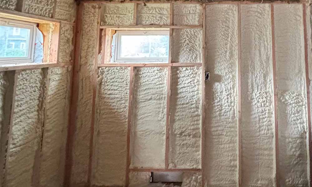 Sprayfoam---Hudson-Insulation-gallery-1 Hudson Insulation spray foam insulation applied to framed walls and ceiling near dual windows, Elizabeth, NJ.